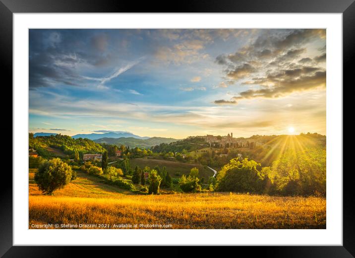 Urbino city and countryside landscape at sunset. Marche, Italy Framed Mounted Print by Stefano Orazzini