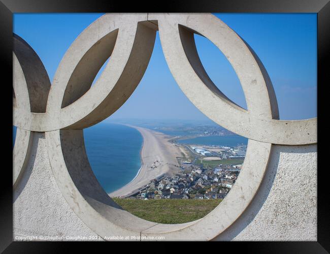 Chesil Beach through the Olympic Rings Framed Print by Stephen Coughlan