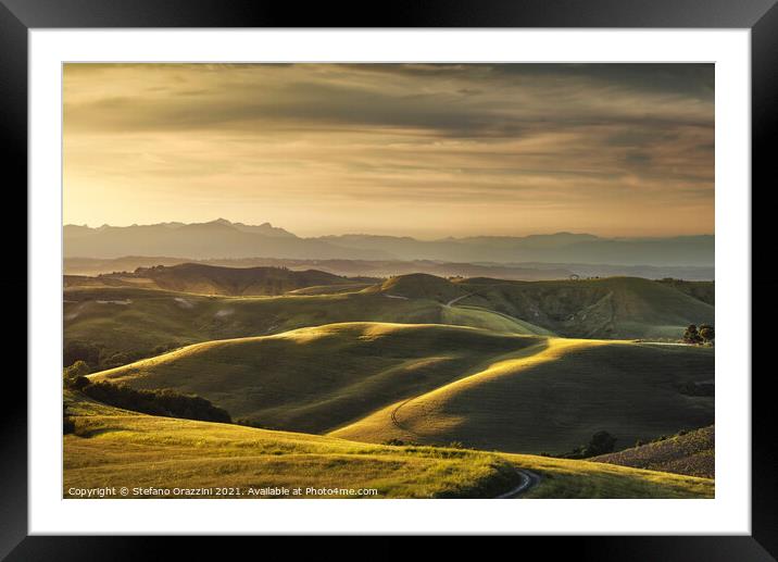 Tuscany, rolling hills at sunset. Volterra Framed Mounted Print by Stefano Orazzini