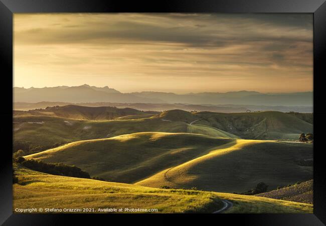 Tuscany, rolling hills at sunset. Volterra Framed Print by Stefano Orazzini
