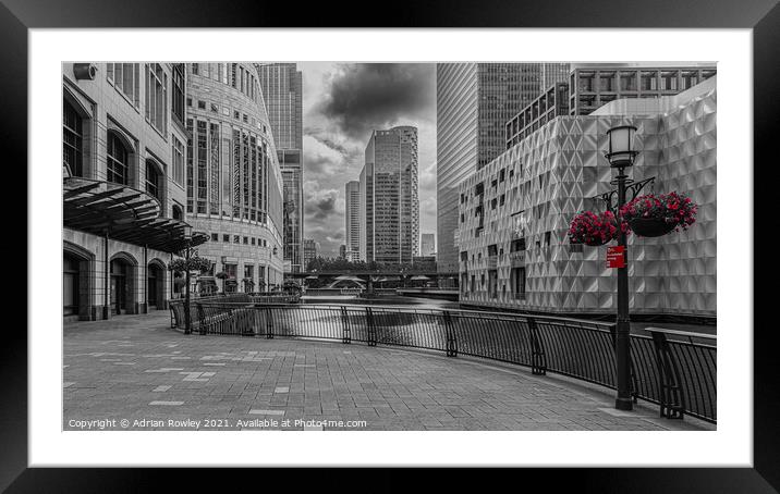 Canary Wharf, London in monochrome with selected colour Framed Mounted Print by Adrian Rowley