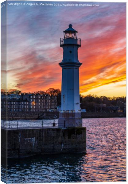 Newhaven Lighthouse at sunset, Edinburgh Canvas Print by Angus McComiskey