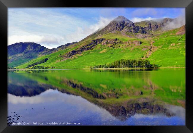 Mountain reflections, Cumbria, UK. Framed Print by john hill