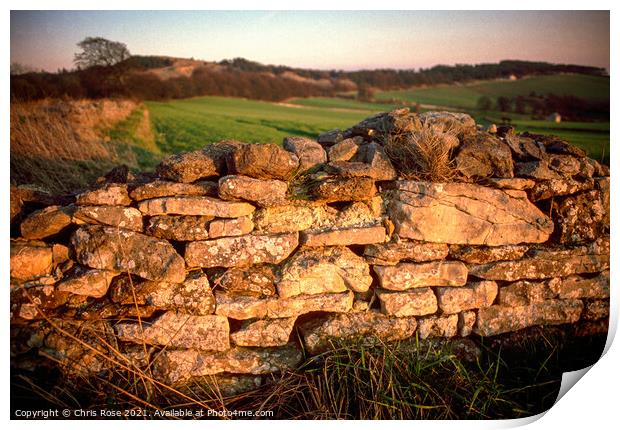 Cotswolds, late sun on a cotswold stone wall Print by Chris Rose