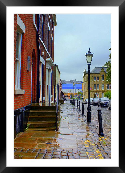 A Rainy Street in Blackburn Framed Mounted Print by Jacqui Kilcoyne