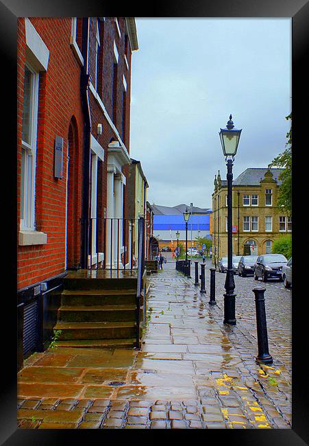 A Rainy Street in Blackburn Framed Print by Jacqui Kilcoyne