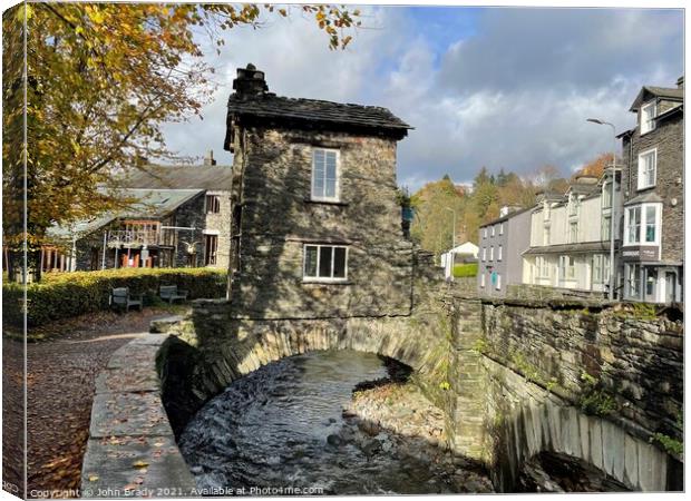 The Bridge House, Ambleside, Lake District Canvas Print by John Brady