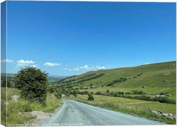Beautiful picture of road in the Yorkshire Dales Canvas Print by John Brady