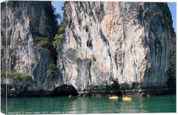 Tourists in inflatble canoes exploring Koh Hong, hang Nga Bay, h Canvas Print by Kevin Hellon