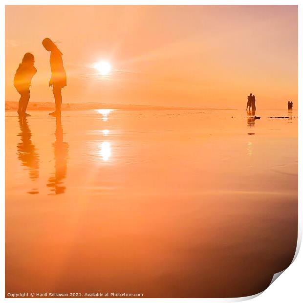 Silhouetted people in a row on sand beach Squared Print by Hanif Setiawan