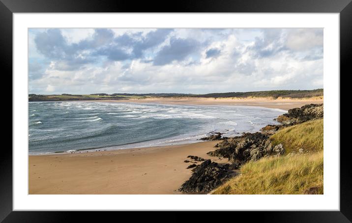 Waves enter the bay at Newborough  Framed Mounted Print by Jason Wells