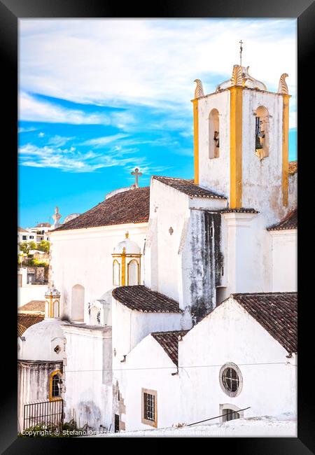 Church and white facades in Tavira, Portugal Framed Print by Stefano Orazzini