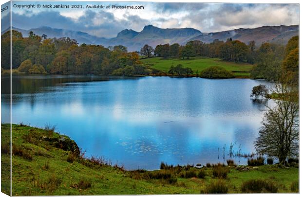 Langdale Pikes behind Loughrigg Tarn  Canvas Print by Nick Jenkins