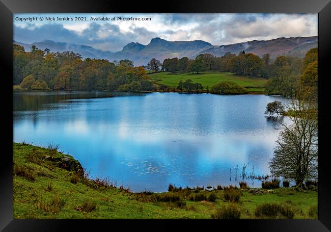 Langdale Pikes behind Loughrigg Tarn  Framed Print by Nick Jenkins
