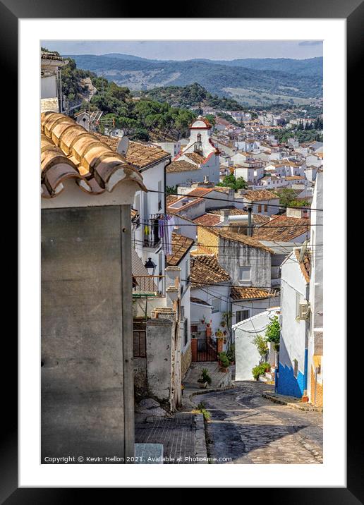 Narrow, steep street overlooking Ubrique, Framed Mounted Print by Kevin Hellon