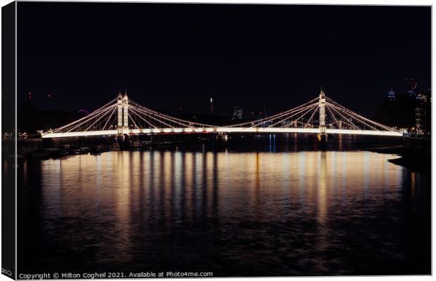 Iconic Albert bridge at night, reflected in the River Thames Canvas Print by Milton Cogheil