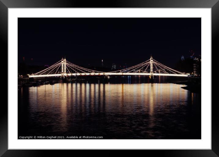 Iconic Albert bridge at night, reflected in the River Thames Framed Mounted Print by Milton Cogheil