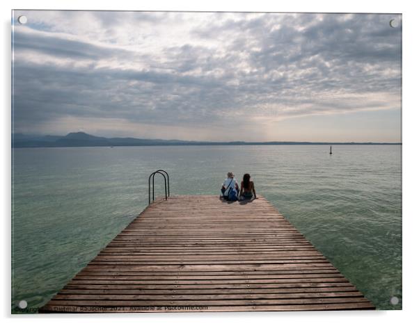 Tourists Sitting on jetty on Lake Garda in Sirmione Acrylic by Dietmar Rauscher