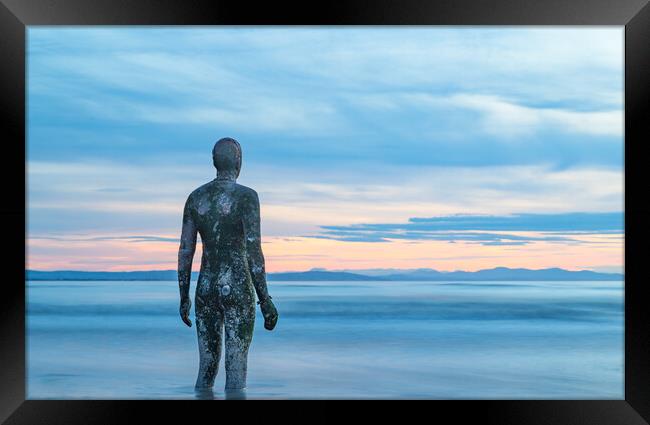 Iron Man standing in water Framed Print by Jason Wells