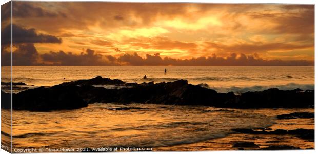Sunset Surfers Fistral Beach Newquay Canvas Print by Diana Mower