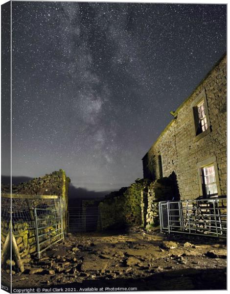 Milky Way and derelict Swaledale farmhouse. Canvas Print by Paul Clark