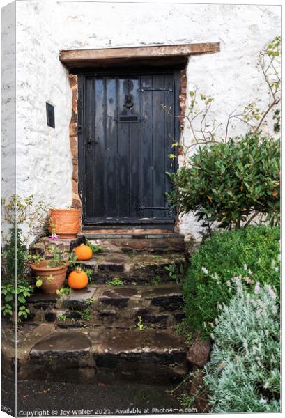 Old cottage door with pumpkins outside, Minehead, Somerset, UK Canvas Print by Joy Walker