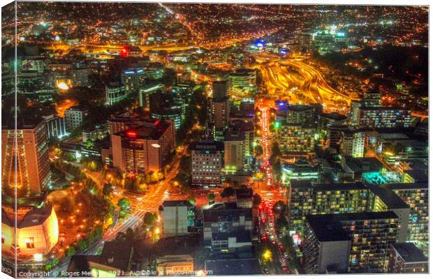 Glowing Auckland Nightscape Canvas Print by Roger Mechan