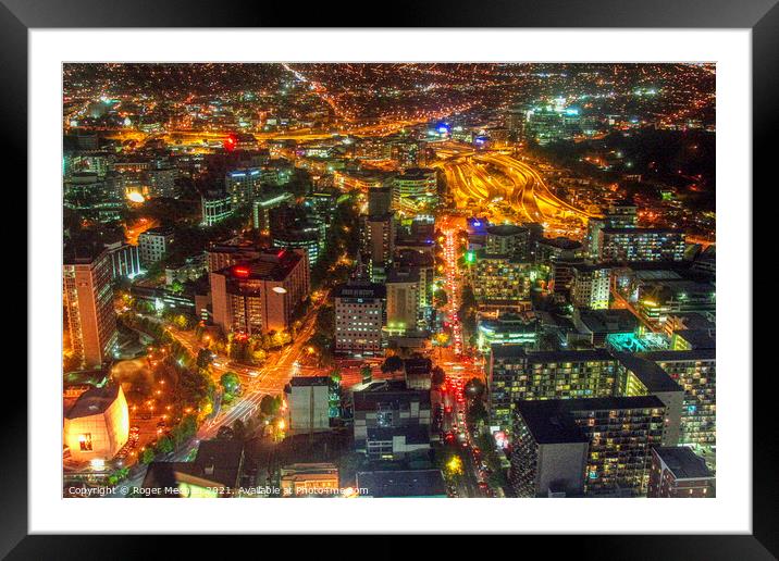 Glowing Auckland Nightscape Framed Mounted Print by Roger Mechan