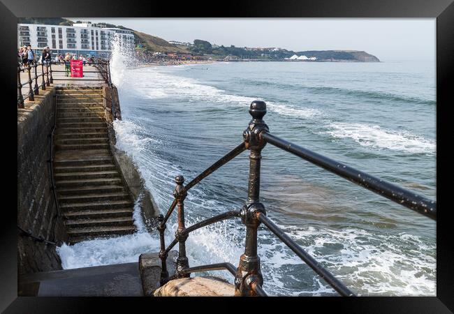 Waves crash into the steps and promenade Framed Print by Jason Wells