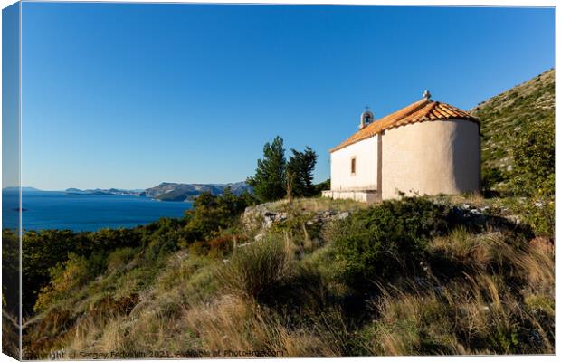 Church of St. Ana over Cavtat town in south Dalmatia, Croatia Canvas Print by Sergey Fedoskin