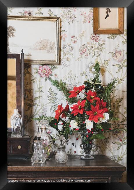 Vase Of Christmas Poinsettia's Framed Print by Peter Greenway