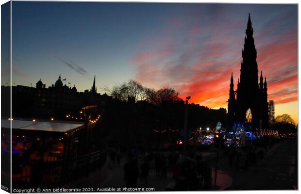 Sunset over Scott monument in Edinburgh  Canvas Print by Ann Biddlecombe