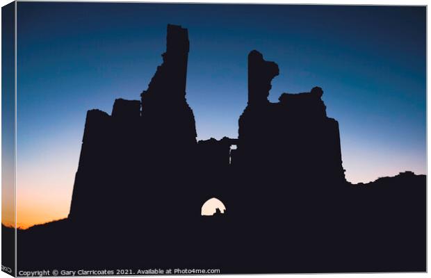 Dunstanburgh Silhouette Canvas Print by Gary Clarricoates