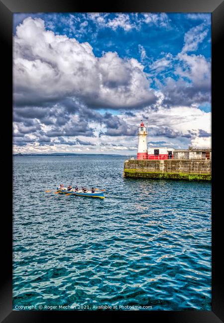 Racing Through the Sea Spray Framed Print by Roger Mechan