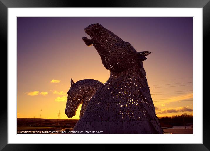 Kelpies as the sun sets Framed Mounted Print by Ann Biddlecombe