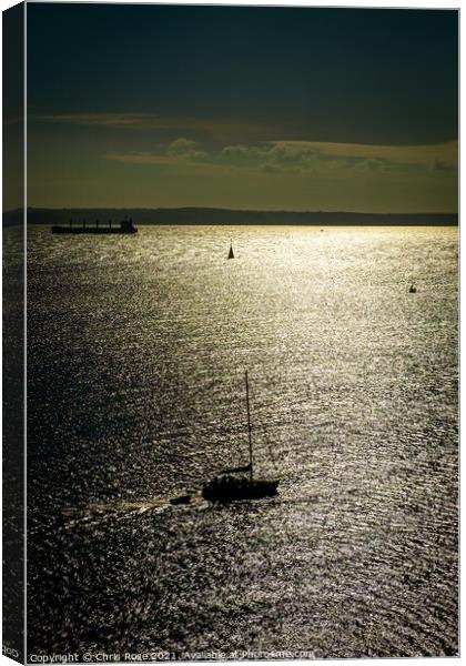 A silhouetted sailing boat Canvas Print by Chris Rose