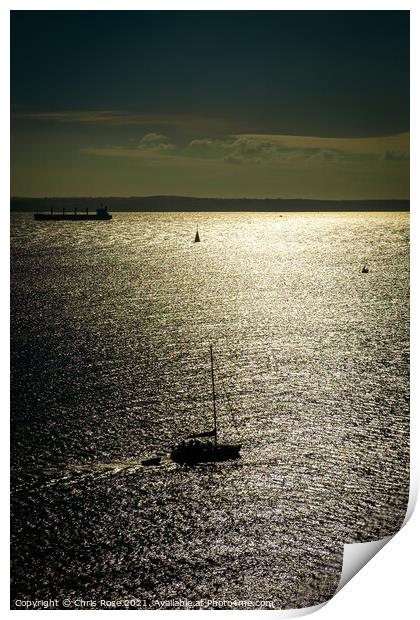 A silhouetted sailing boat Print by Chris Rose