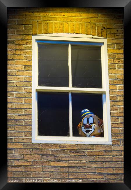 Clowns head at window Framed Print by Allan Bell