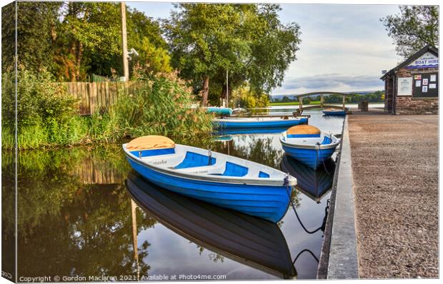 Boats moored in Llangorse Lake Brecon Beacons Canvas Print by Gordon Maclaren