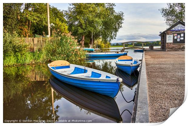 Boats moored in Llangorse Lake Brecon Beacons Print by Gordon Maclaren