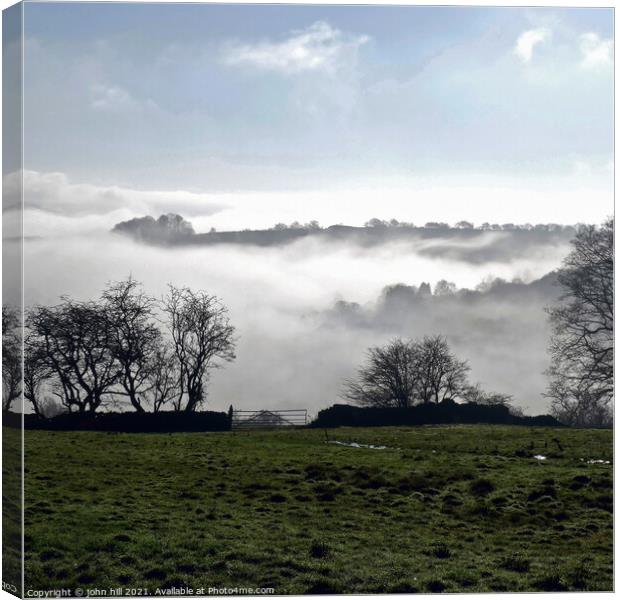 Above the Morning mist in Derbyshire. Canvas Print by john hill
