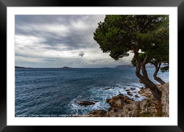 Cloudy weather over the Adriatic coast. Croatia Framed Mounted Print by Sergey Fedoskin
