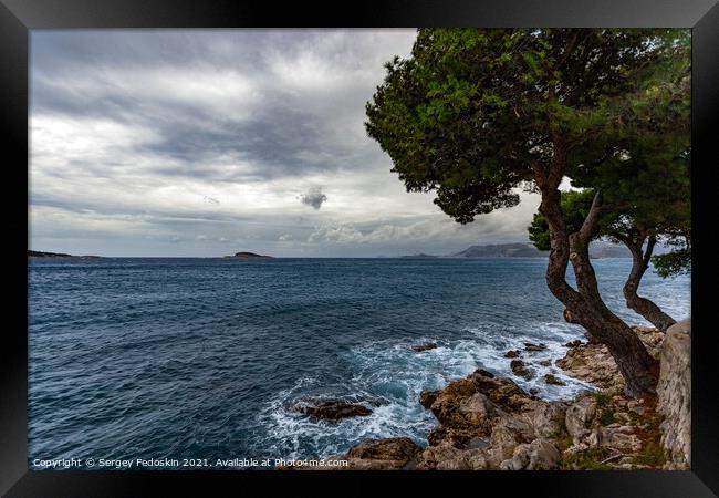 Cloudy weather over the Adriatic coast. Croatia Framed Print by Sergey Fedoskin