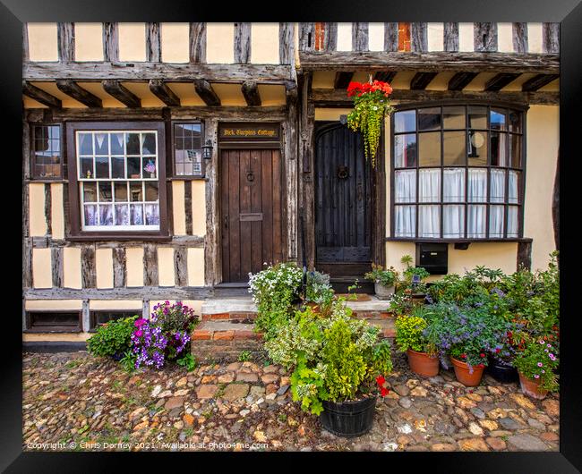 Timber-Framed Cottages in Thaxted, Essex Framed Print by Chris Dorney