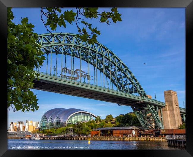 Tyne Bridge and Sage Gateshead in Newcastle upon Tyne, UK Framed Print by Chris Dorney