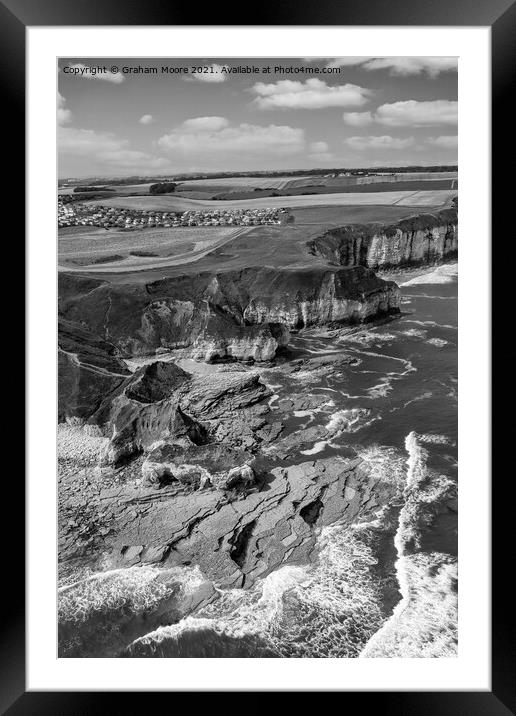 Thornwick Bay looking north monochrome Framed Mounted Print by Graham Moore