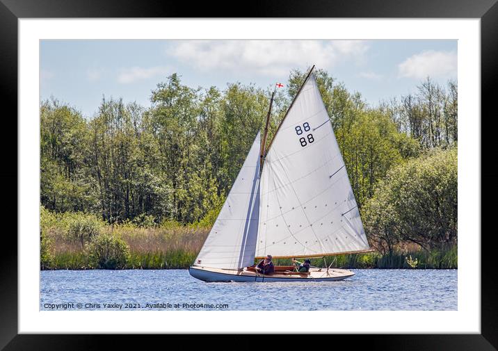Traditional wooden sailboat on Wroxham Broad, Norfolk Framed Mounted Print by Chris Yaxley