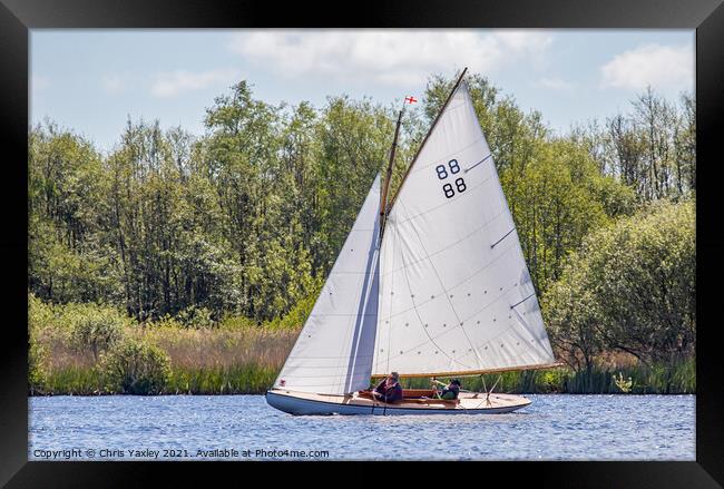 Traditional wooden sailboat on Wroxham Broad, Norfolk Framed Print by Chris Yaxley