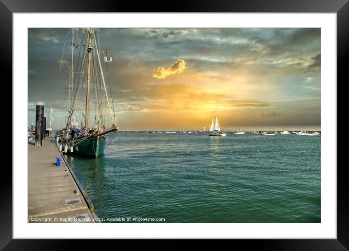 Lone Yacht Sailing Towards the Solent from Isle of Framed Mounted Print by Roger Mechan