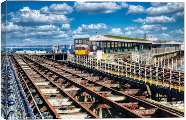 Departing Ryde: A Train and its Solent Scenery Canvas Print by Roger Mechan